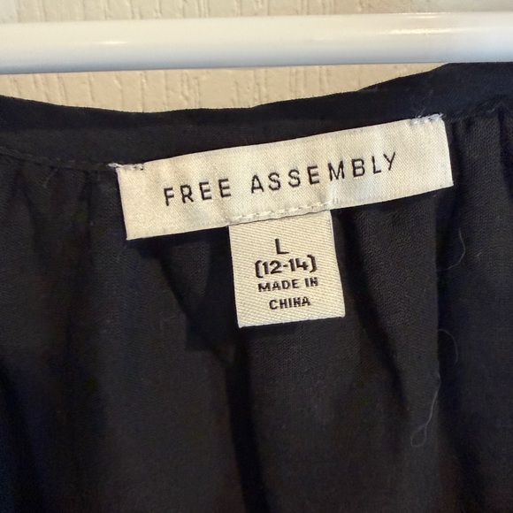 Chic Black Eyelet Mini Dress - Picture 4 of 5